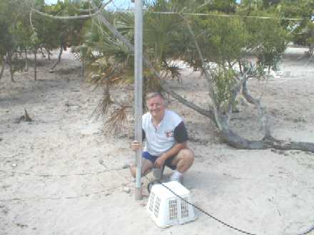 Don K9NR at the base of the 160 transmit antenna